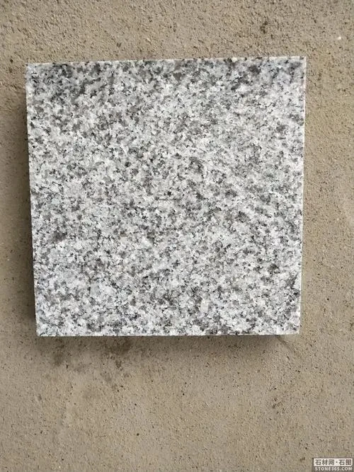 low price natural granule granite polished paving stone sesame white