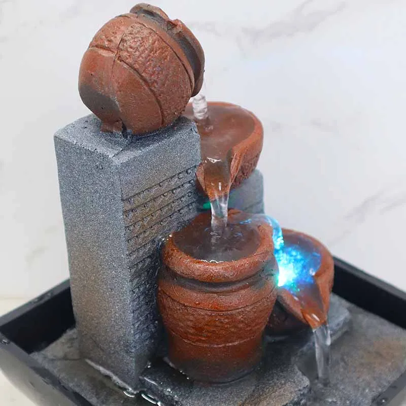 High Quality 4-Tier Barrel Shape Mini Desktop Water Fountain Natural River Resin Tabletop Fountain With Led light