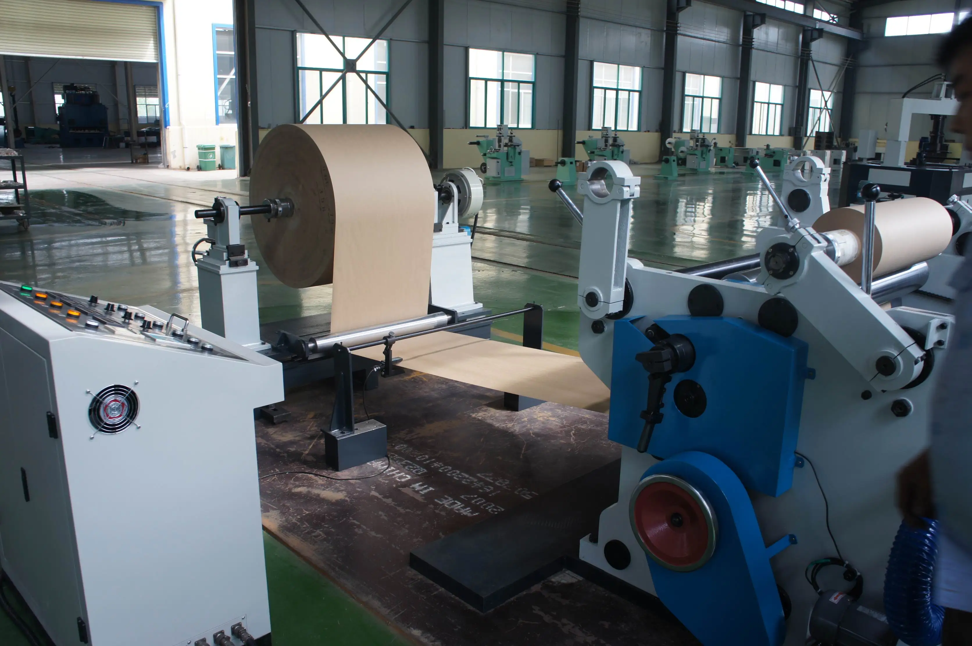
Economic kraft/brown/tape/gold/siliver/film paper slitting machine rewinding machine for sale from BAOJI XINTAI 