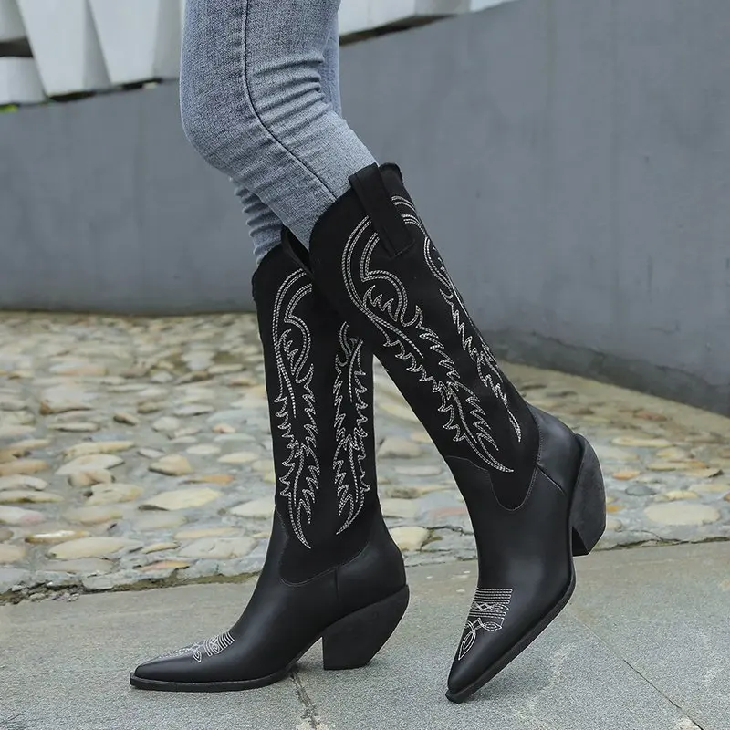 
Autumn and winter new ladies leather boots European and American style pointed V-mouth embroidered high boots 