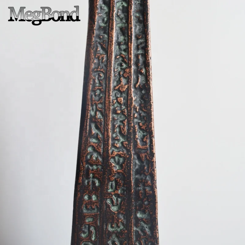 Antique bronze cast iron Egyptian traditional obelisk in metal material