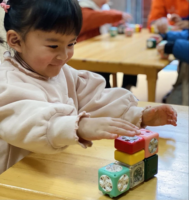 All That Wheels Moving and Turning Programmable Interactive Magnet Building Blocks