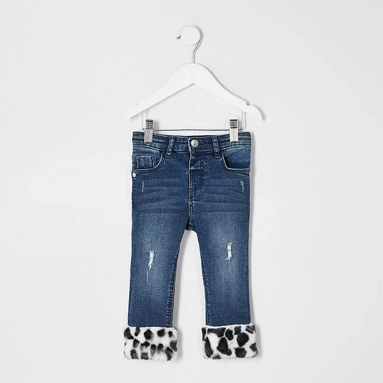 
Factory wholesale mini girls blue distressted faux fur hem denim jeans 
