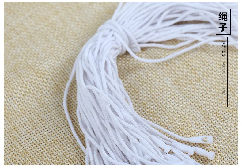 Custom three strand cotton rope hanging grain bullet bullet lifting grain white black semi-bleached hanging grain