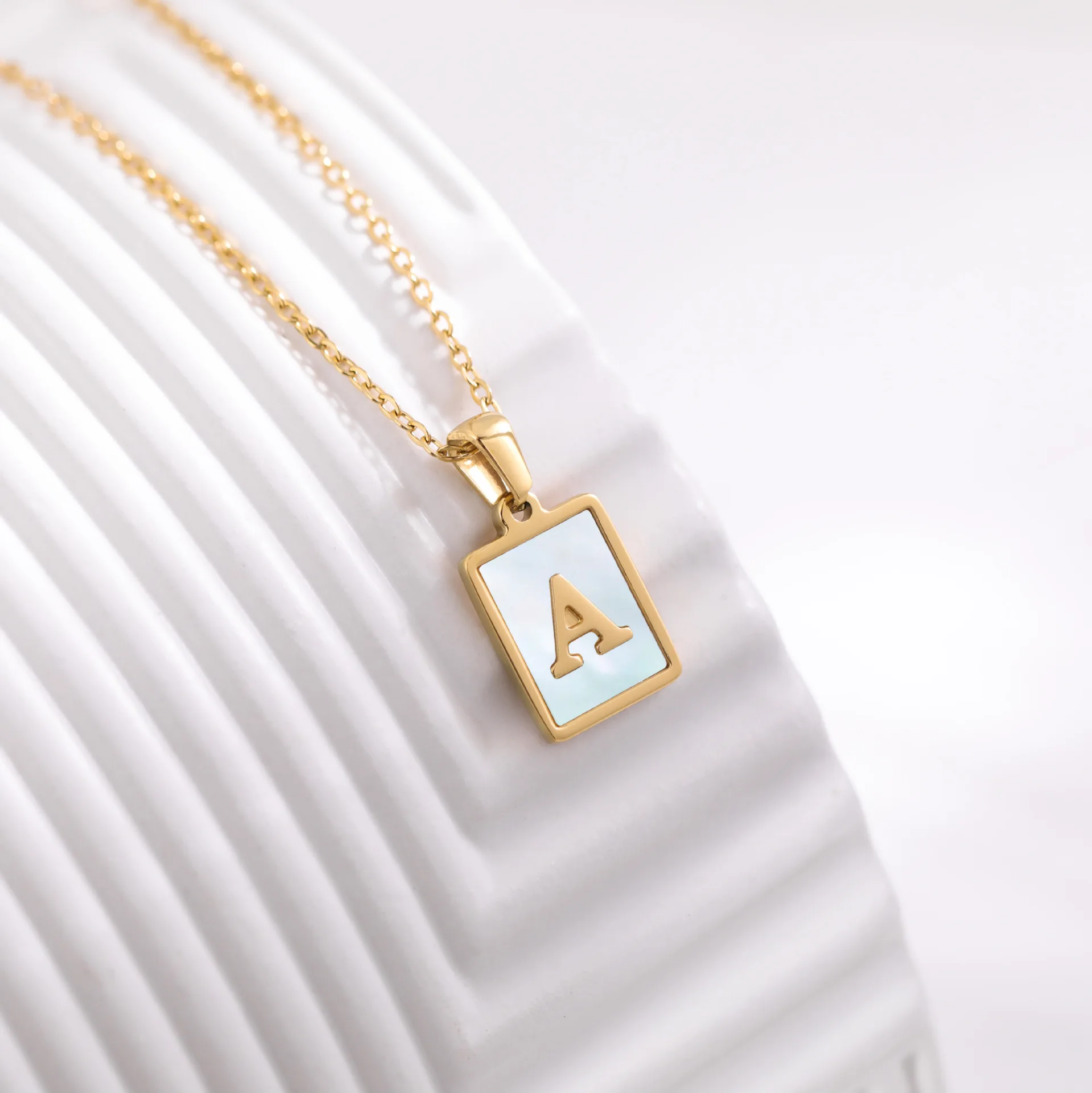 Titanium steel English Pendant with gold shell New stainless steel square letter necklace