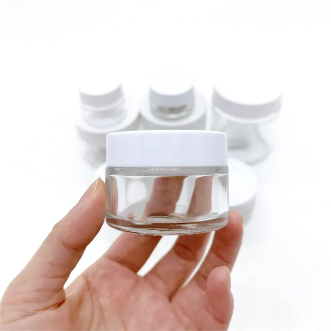 Custom Design Round 1oz 2oz 3oz 4oz Straight Side Food Glass Jar With Child Resistant Lids Glass Jar Child Proof