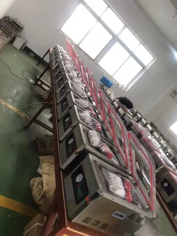 meat and egg dz-260 table type single chamber packaging machinery /vacuum packing machine/fish meat bag vacuum packaging machine