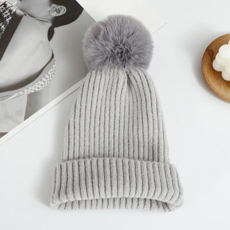 Autumn and winter double knitted running skiing knit cap Warm simple fashion solid color versatile wool beanie with Pom Pom