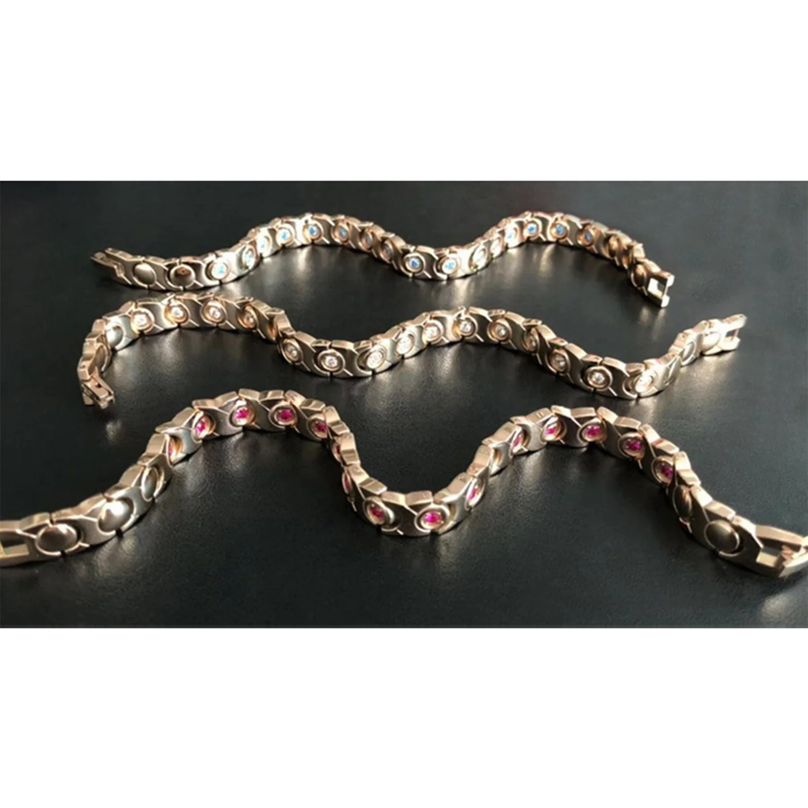 
9112 Womens fashion trendy 2021 rose gold charm bracelets blue diamond key chains bangle black magnet gall stone hand chain OEM 