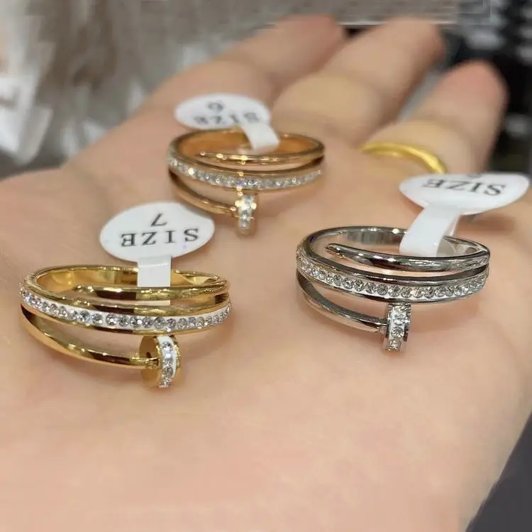 Simple Fashion Brand Jewelry Stainless Steel 18K Gold Plated Diamonds Zircons Classic Wedding Nail Rings for Women and Men
