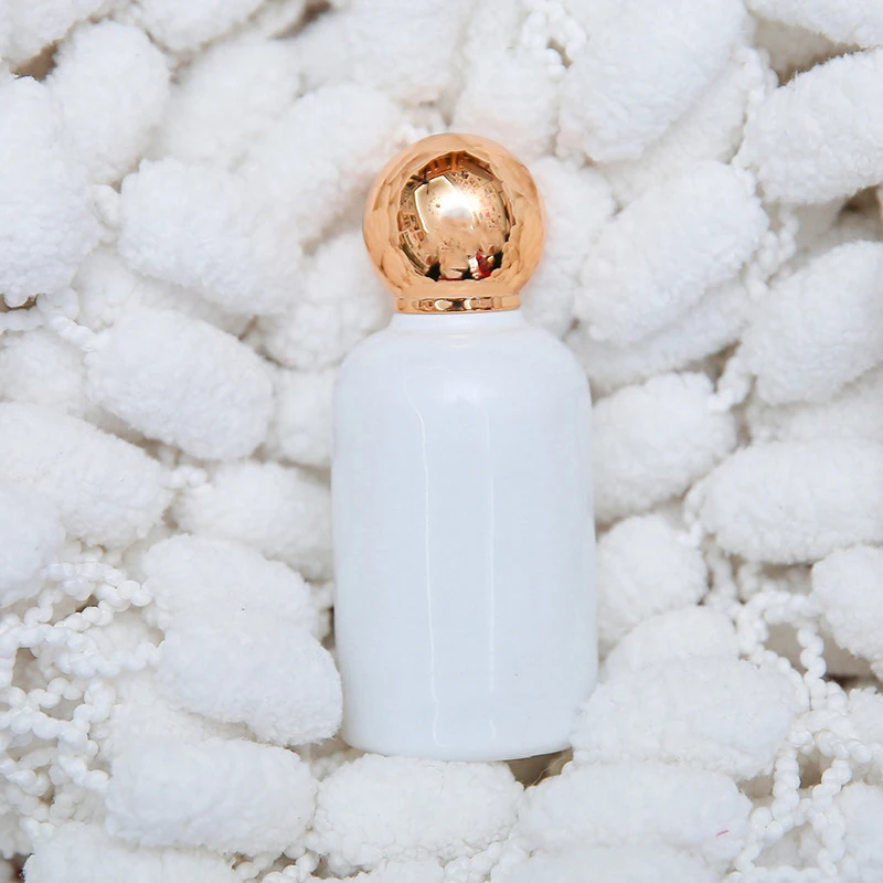 High Quality Cylinder Transparent black perfume bottle OEM 50 ml Glass Perfume Bottle With Gift Box Pump Sprayer