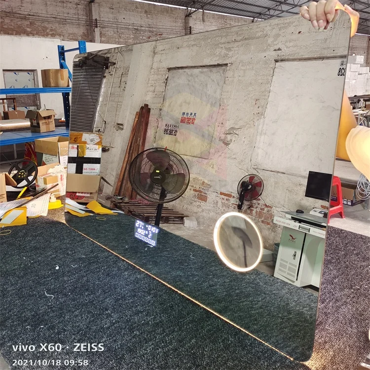 Custom  rectangular frameless smart led mirror with magnifying glass, time, temperature, Bluetooth for bathroom