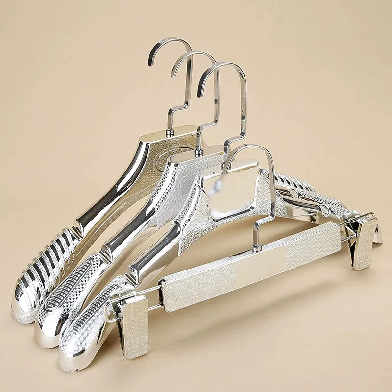 High end electroplated plastic hangers and pants clips, hanging suit hangers in clothing stores
