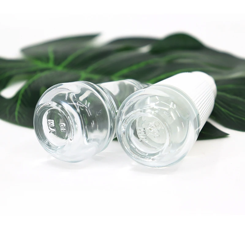 Wholesale 30ml Cosmetics Packing Taper Essential Oil Clear Glass Dropper Bottle With Plastic Outer Cover For Face Essence Serum