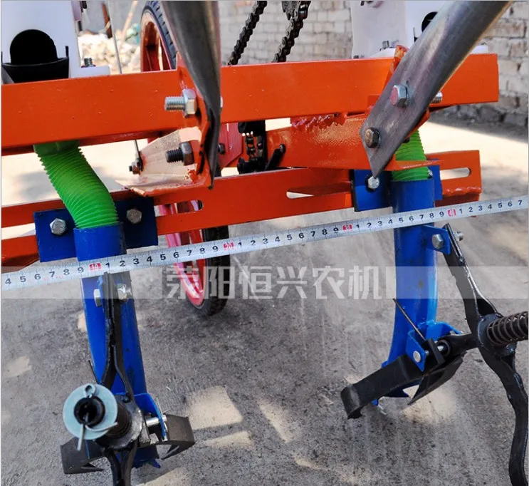 
Hot sale hand push corn seeder,hand seeder spreader,manual corn seeder 