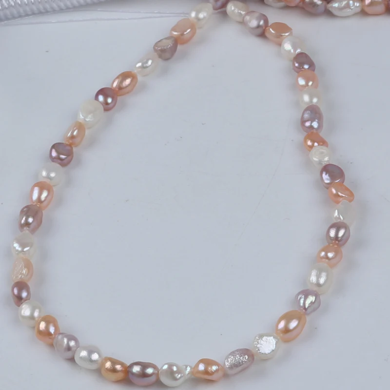 Zhuji 6-7mm White Pink Purple Natural Freshwater Baroque Shape Pearl Stand For Sale