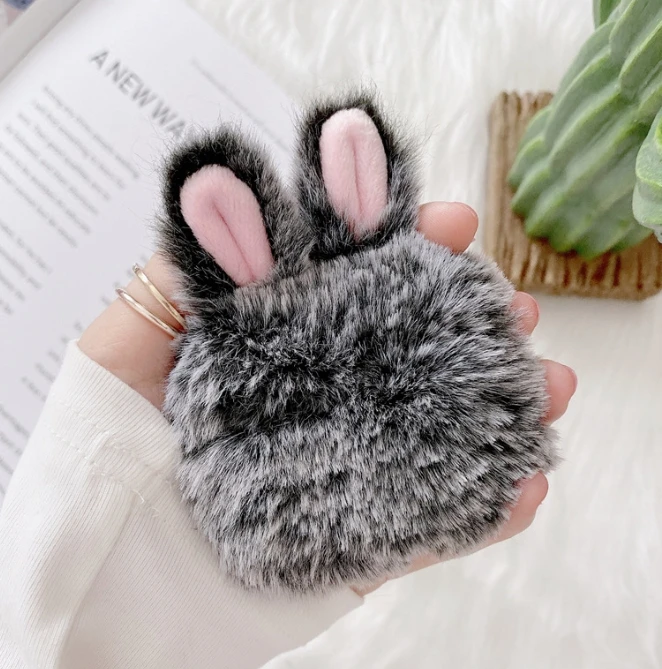 Plush rabbit ears are protected by airpods pro2 headphones headphone case