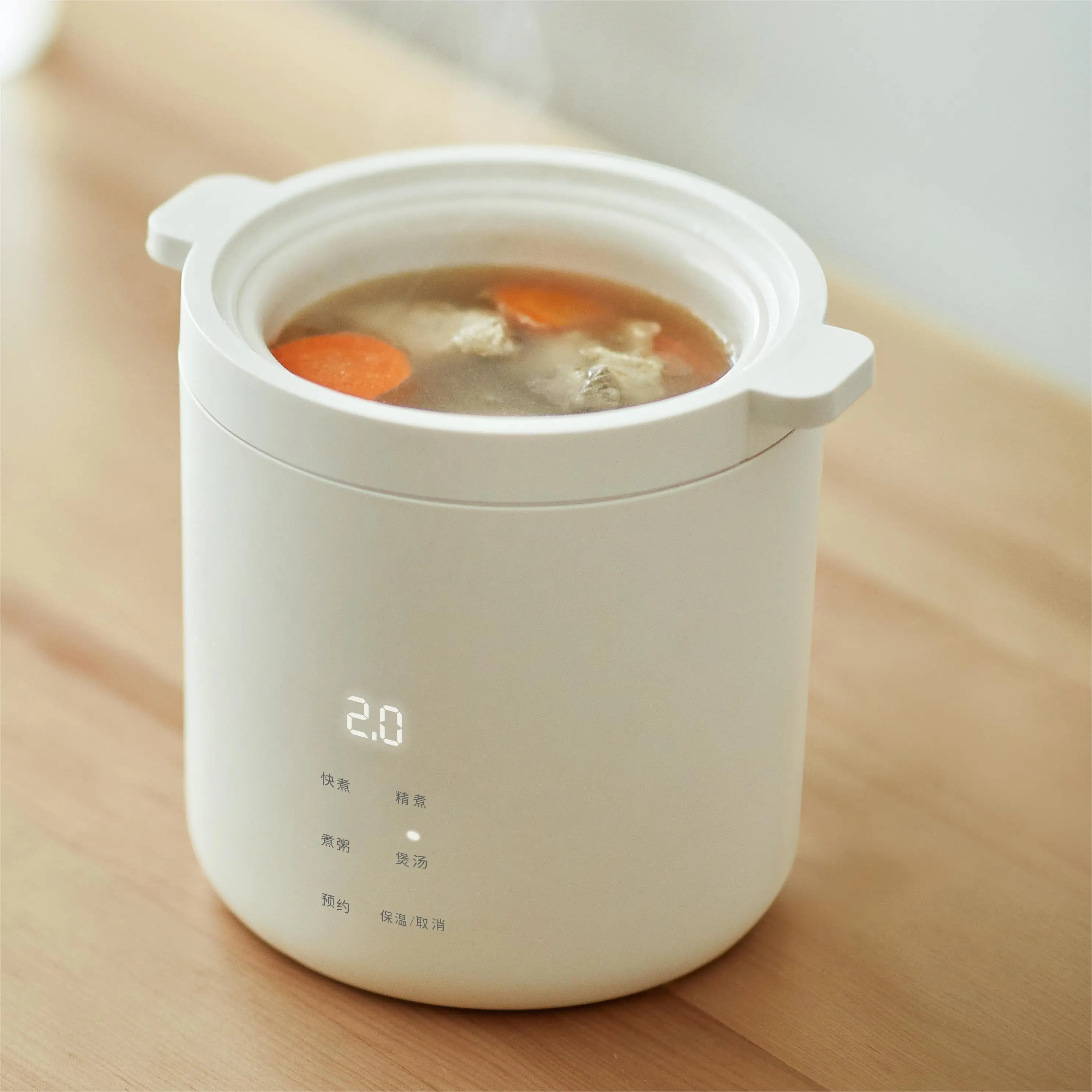 Hot Selling 1.2L Portable Mini Electric Rice Cooker Multicooker With Food Steaming for Personal Rice Soup Cooker