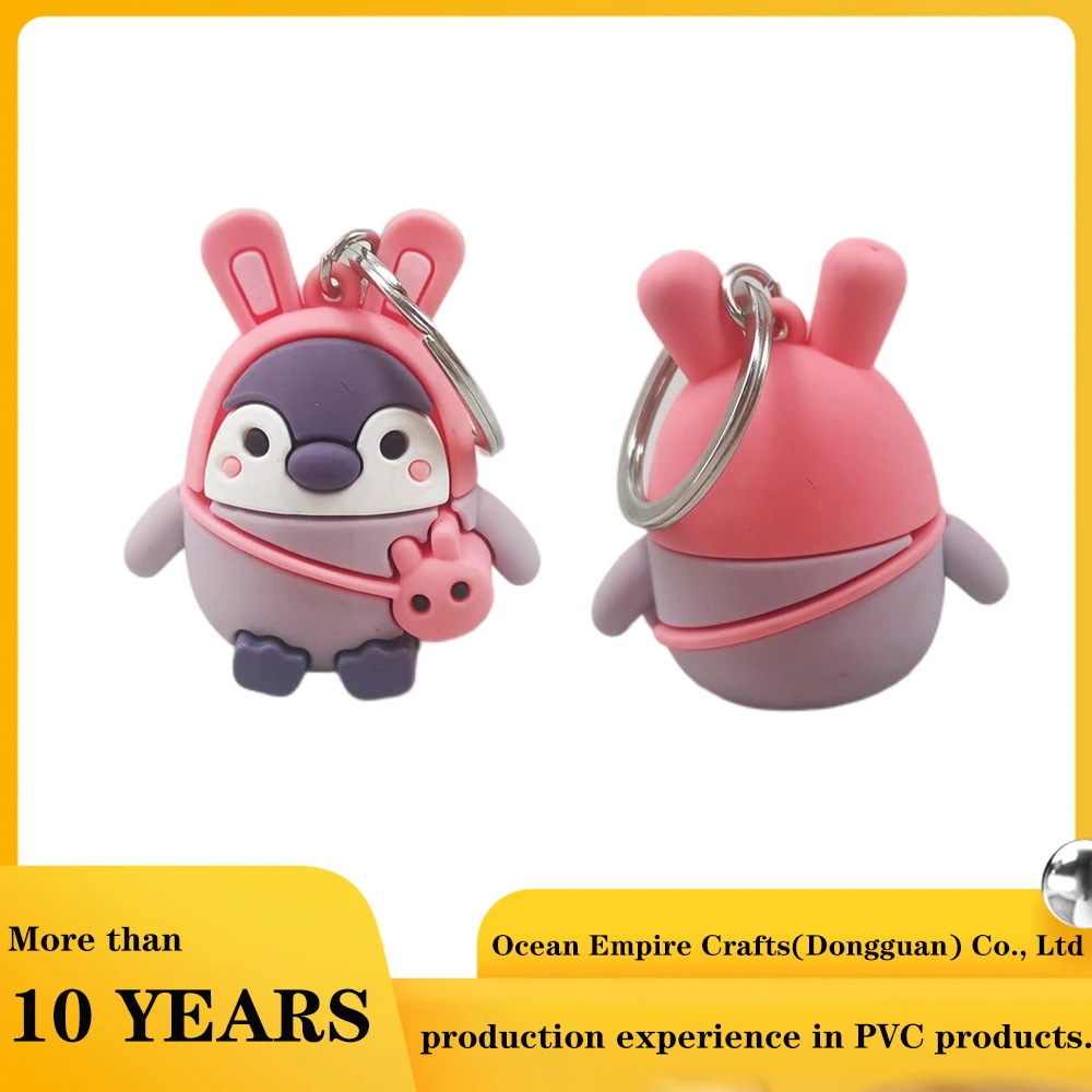 Factory Oem Purple Color Custom Design Cute 3D Pvc Penguin Keychain With Pink Hat