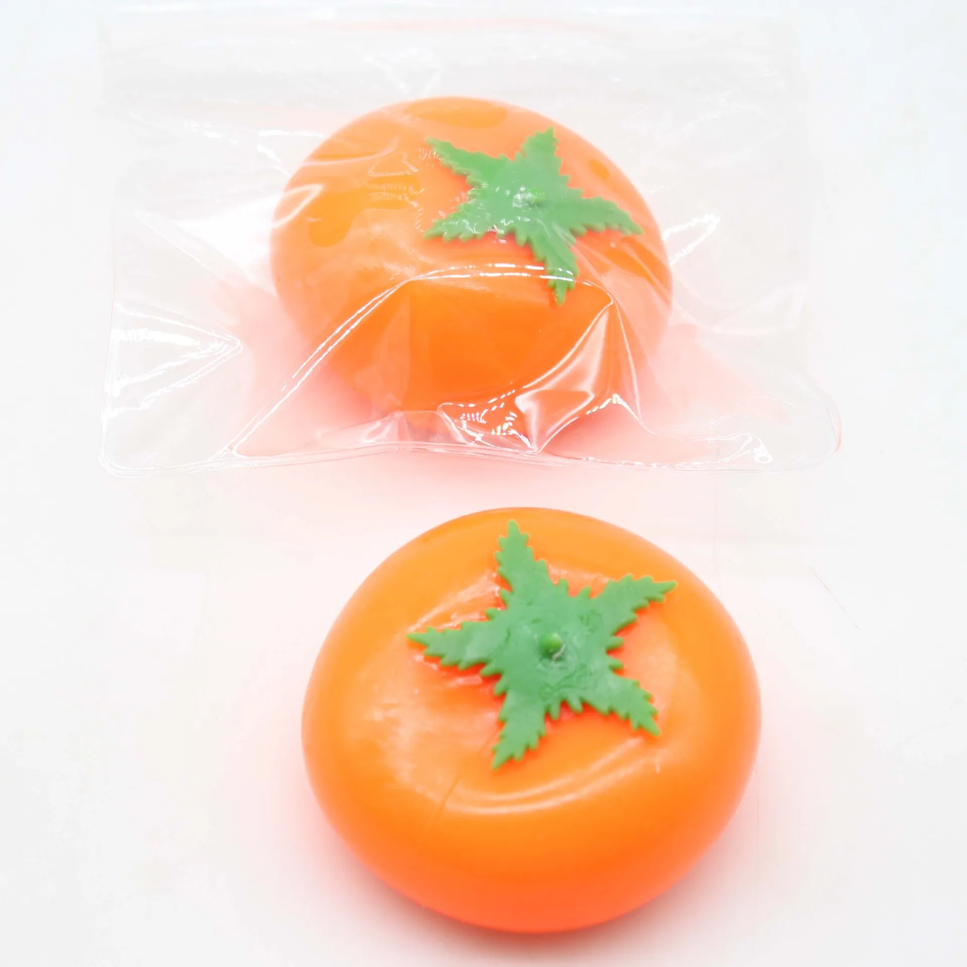 Hot selling simulated soft fruit squeeze toy fun soft persimmon vent relief toy
