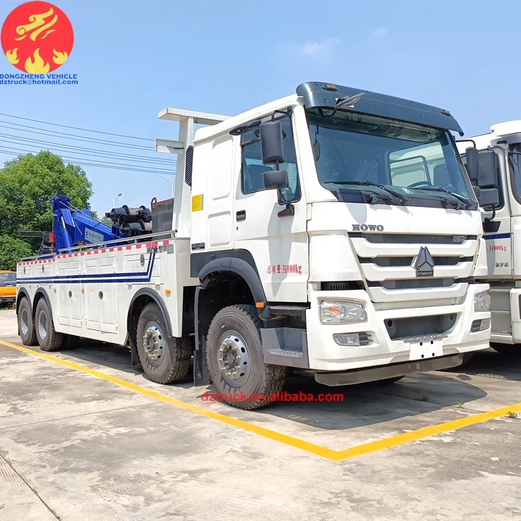 Sinotruck howo 8X4 30tons 50tons LHD heavy duty Dragging and lifting multifunction road wrecker rescue truck fow sale