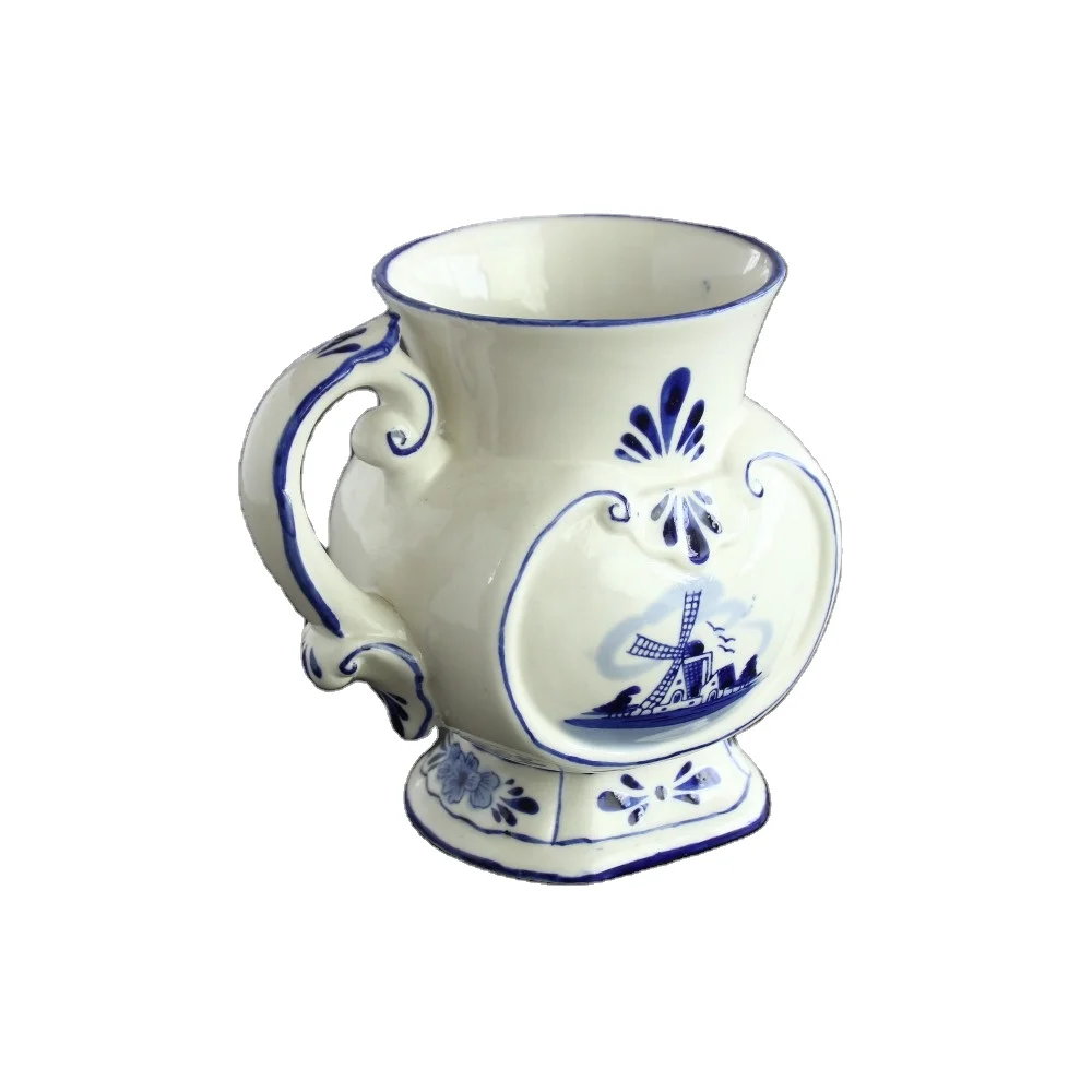 Delft ceramic blue and white water jug milk cup