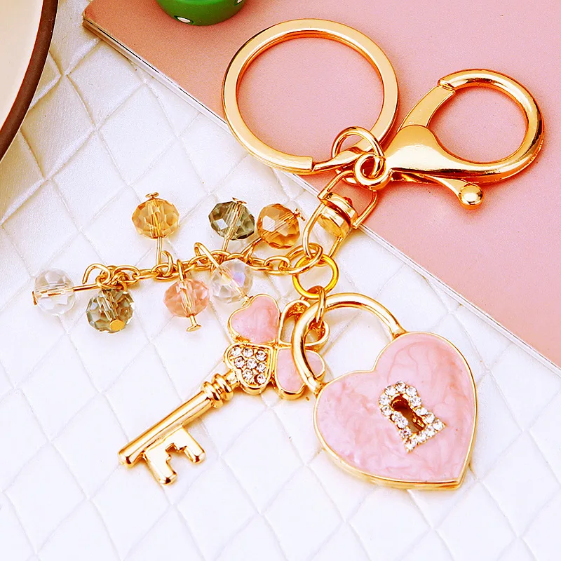 Wholesale Gift Female-Friendly Creative Clover Love Lock Metal Keychain Diamond Inlaid Concentric Lock Bag Pendant