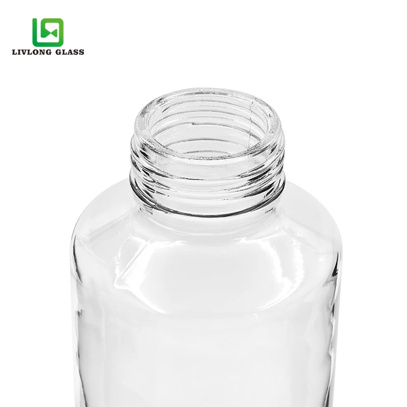 Wholesale 500ml 16OZ clear round voss drinking glass water bottle with screw CAP