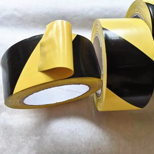 A grade PVC material  Warning Tape floor Caution tape Black Yellow Warning tape jumbo roll with rubber glue coated