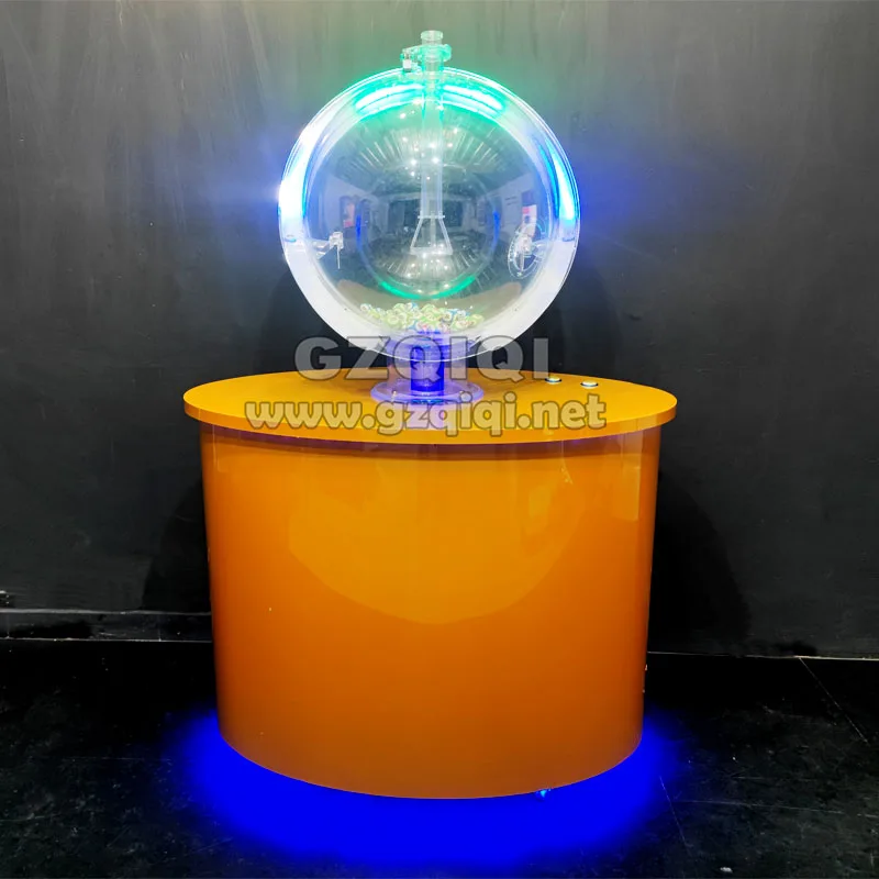 Popular Mark Six Lottery Machine to draw 6+1 balls out in golden machine box