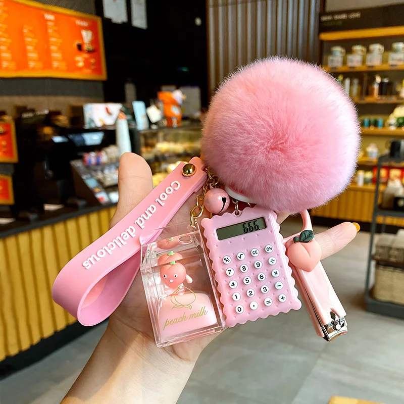 T1893  Cute Hairy Ball Flowing Liquid Key Chain Computer Nail Key Chain Bag Pendant Creative Milk Bottle Crystal Milk Keychain