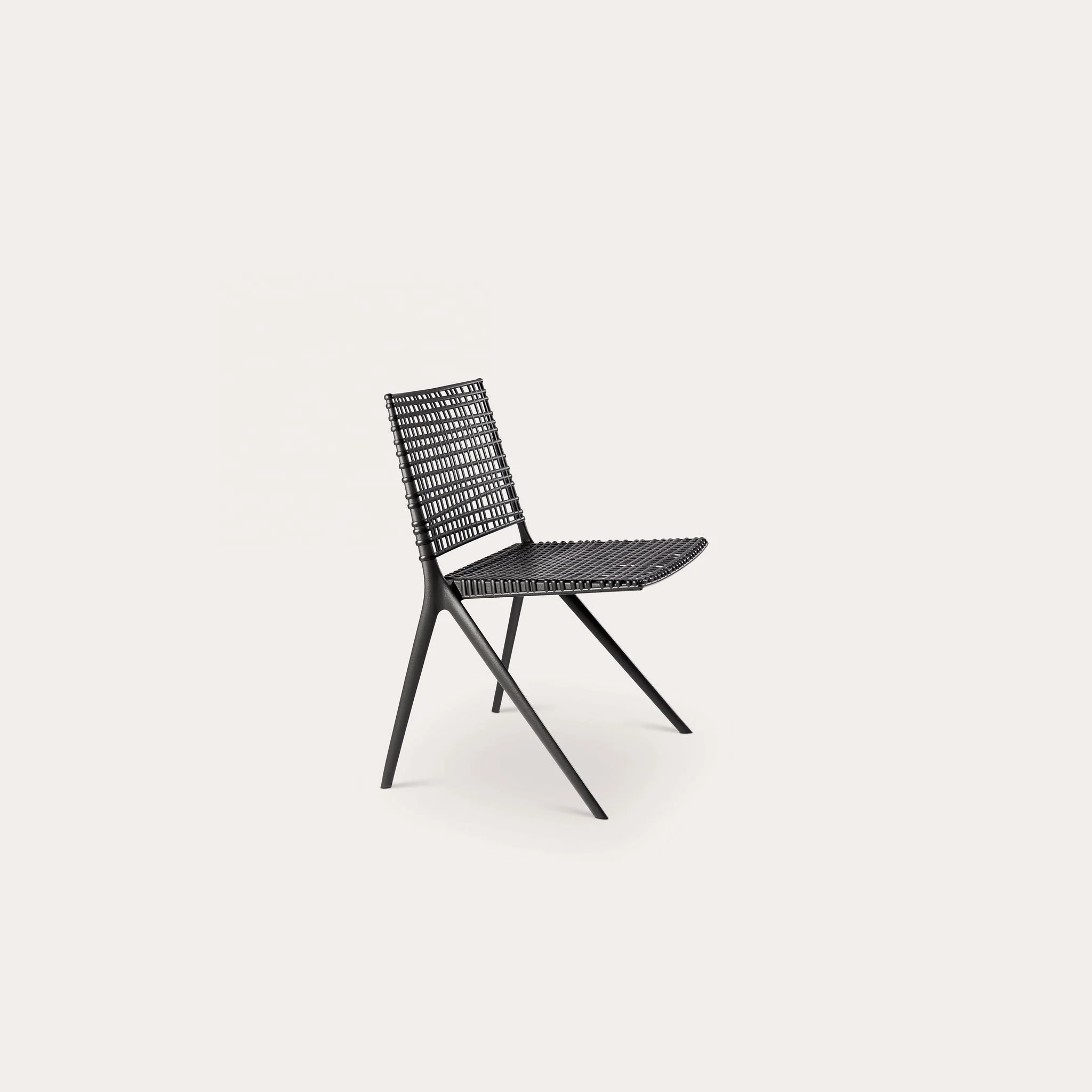 Outdoor stackable chairs with metal and rope woven seat and back for modern dining armless rope and rattan chair