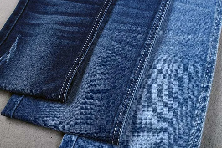 cheap 9oz yarn dyed indigo denim spandex cotton fabric stock lot