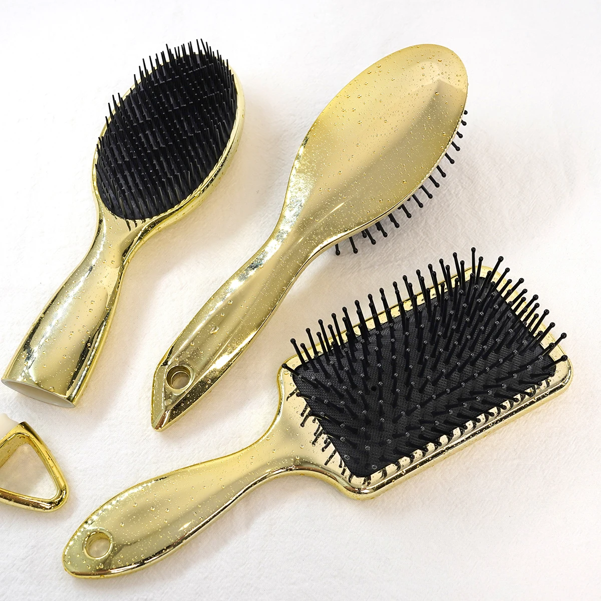 2022 New Arrival Water Drop Gold Electroplating Mermaid Paddle Cushion Hollow Detangler Hair Brush Styling Hair Brush Set
