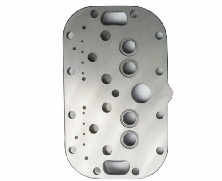 Refrigeration compressor metal valve plate