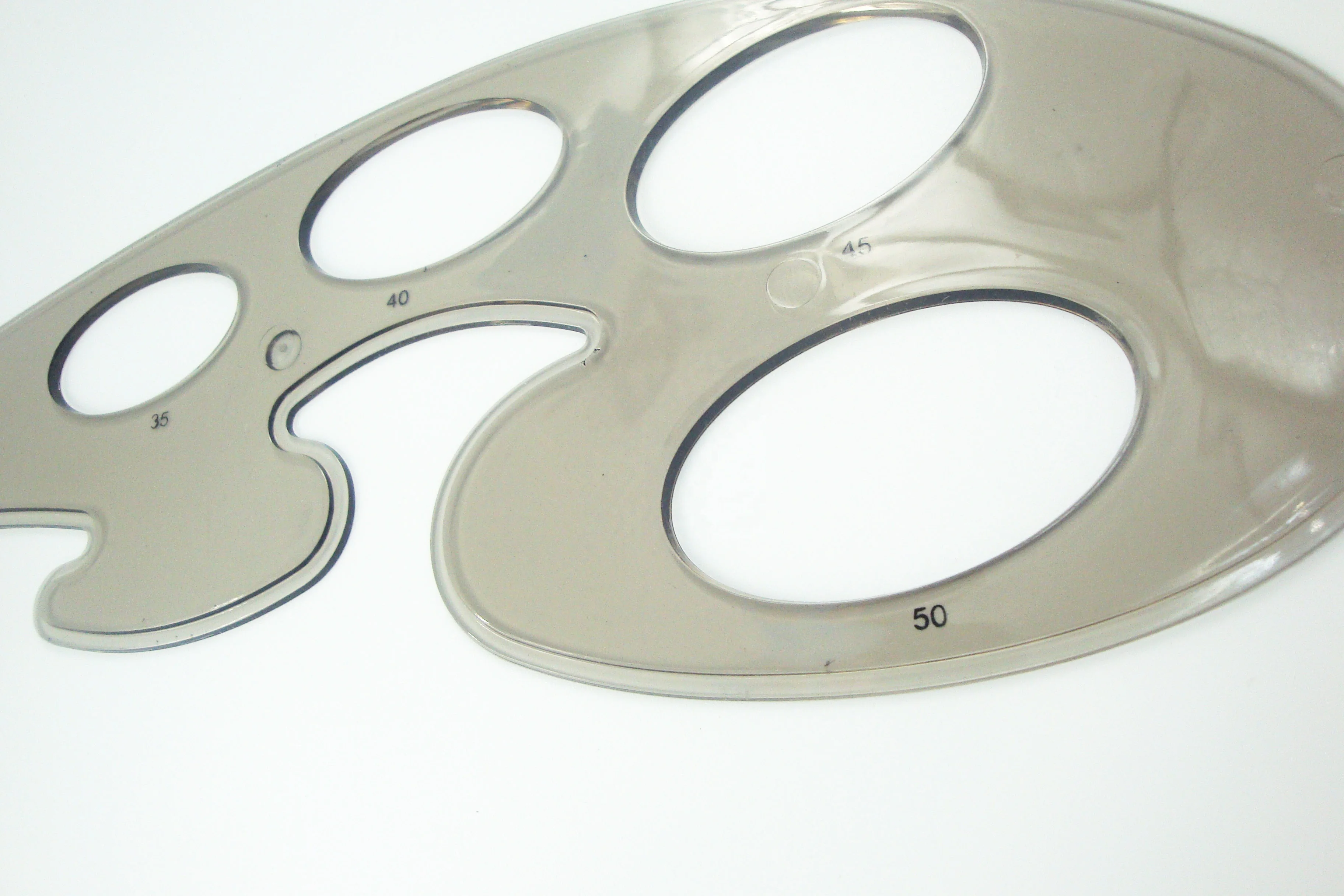 Французская кривая линейка для шитья