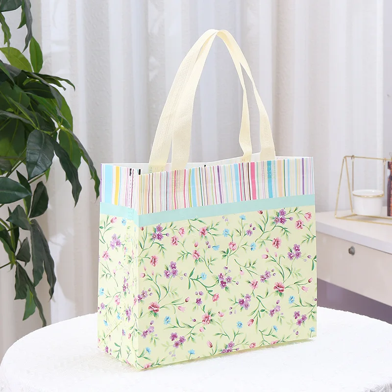 Three dimensional film covered non-woven bag color printing folding clothing store shopping bag cute birthday gift bag