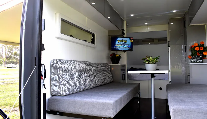 
2021 Ecocampor Factory Supplied Luxury Adventurer 19FT Toy Hauler Camper Trailer RV Caravan with Slide Out Kitchen 