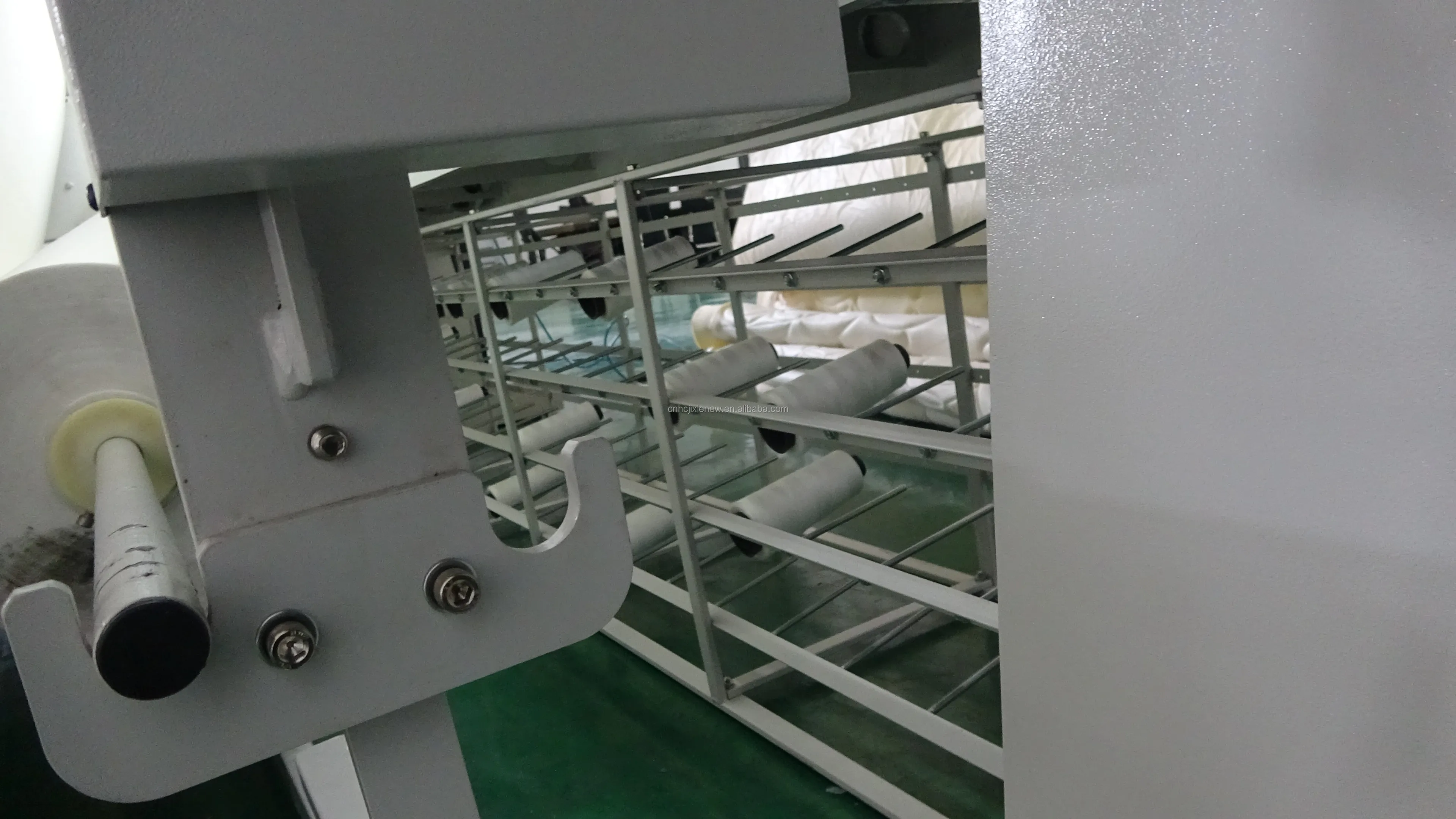 Automatic computerized quilting machine for precision fabric between mattressesn machine