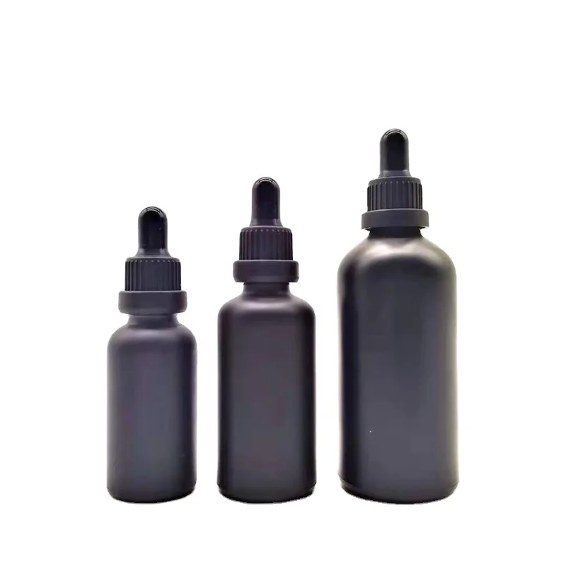 Best selling 30 ml 50ml original shiny black glass dropper bottle 15ml 100ml hair oil essential oil repair serum glass bottle