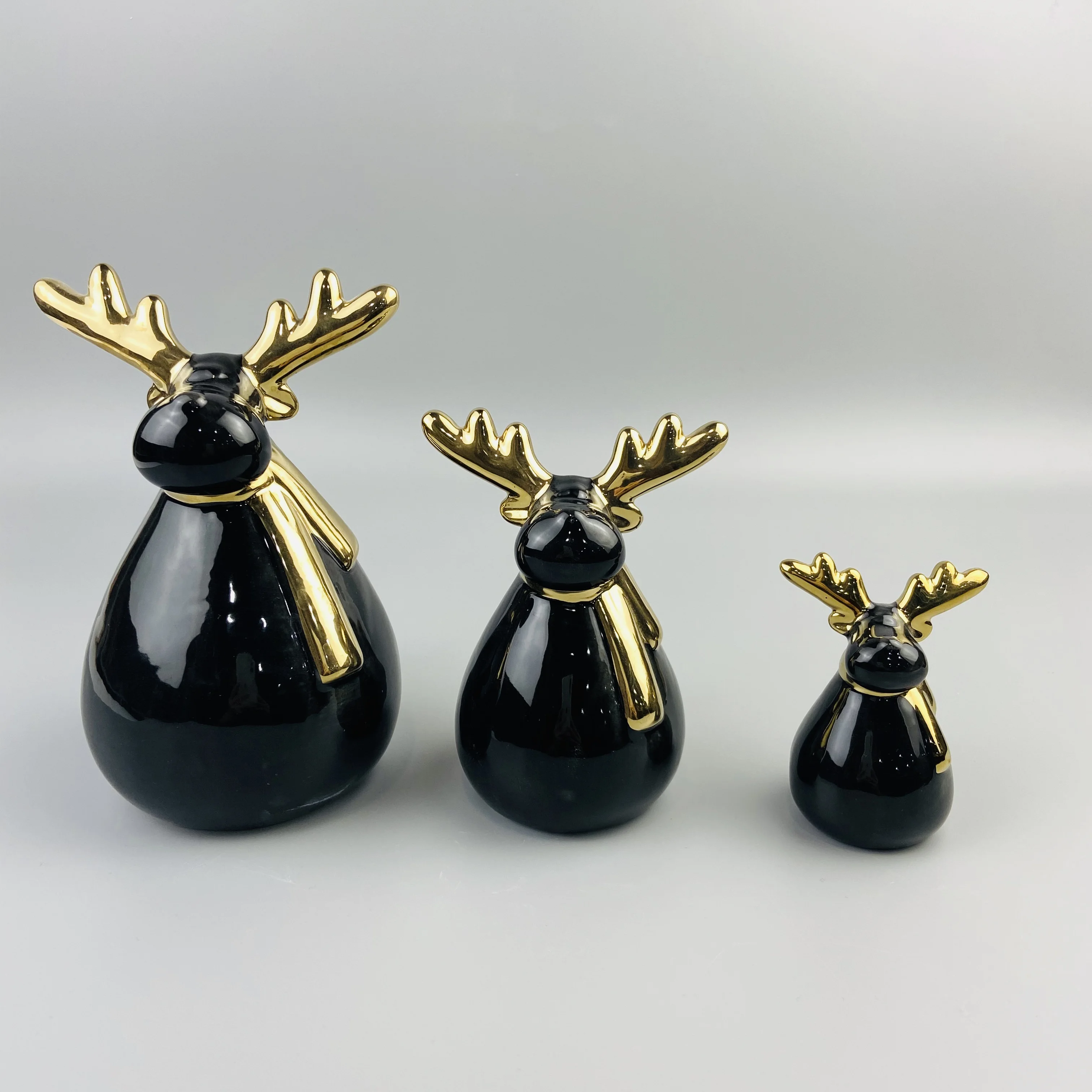 
Newest ball shape body black ceramic deer ornament with gold antler 