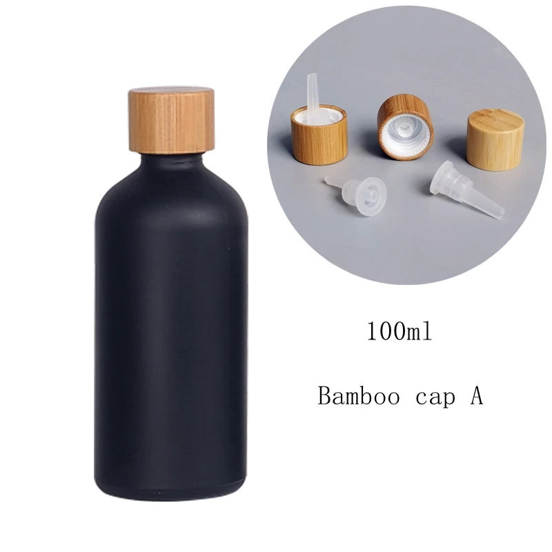 matte black glass bottles 100 ml glass essential oil bottles with 18 mm bamboo lid and drip plug for body massage oil