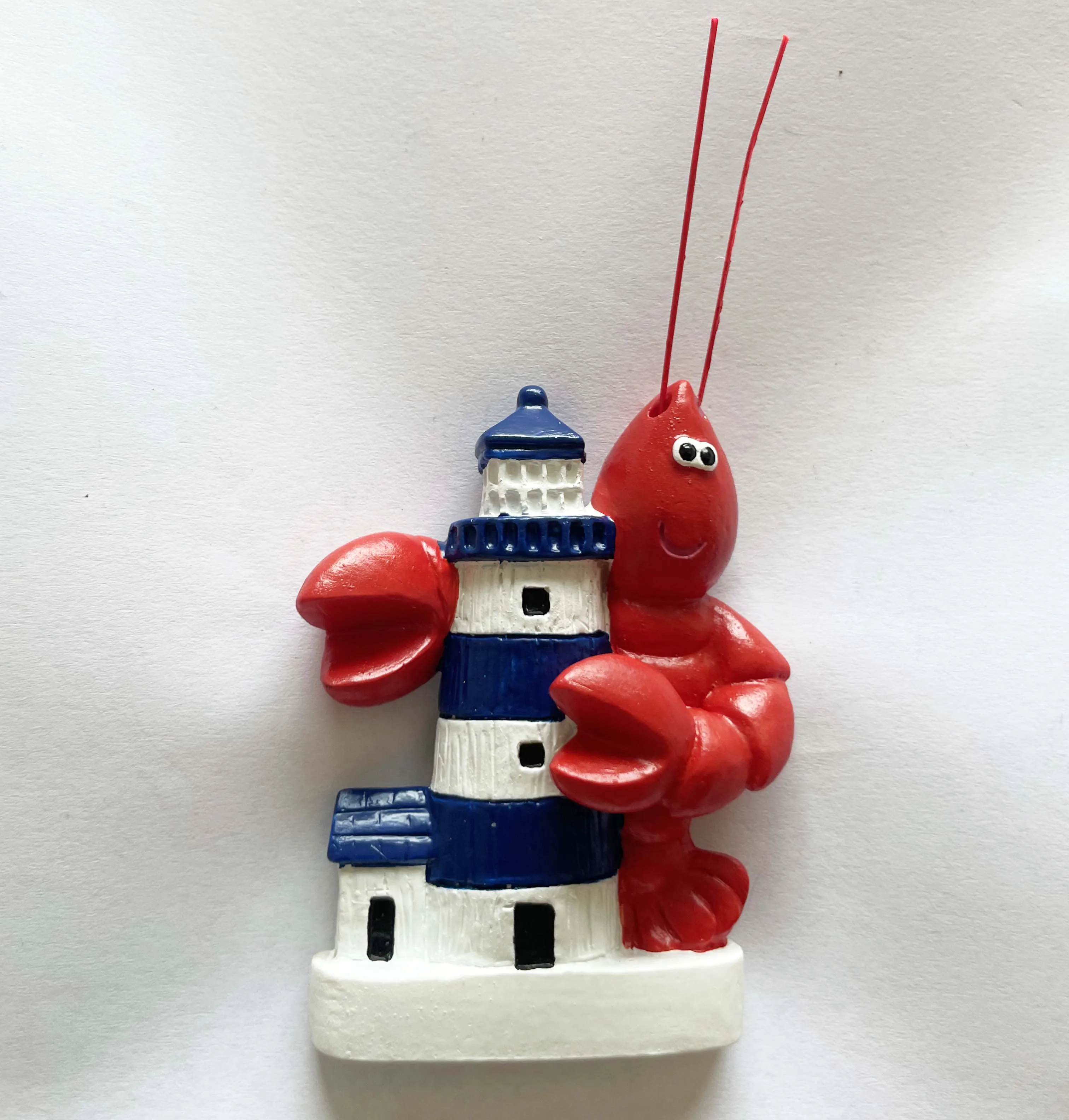 Resin lobster magnet with light house design