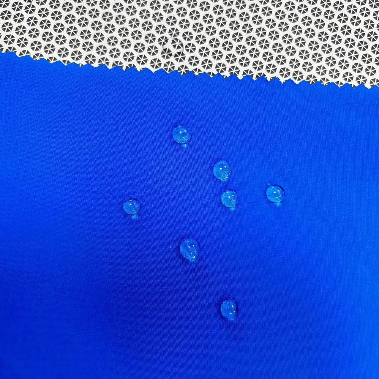 Hot Sale 100%Polyester Face: Ripstop Pongee Backing:Printed TPU membrane Function:Waterproof and Breathable Fabric for clothing