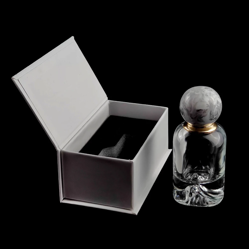 50ml Custom design high quality luxury thick base special crystal clear glass perfume bottle with resin cap