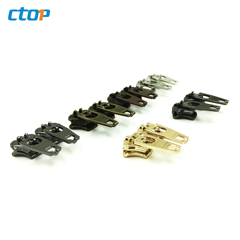 Wholesale YG brass spring lock sliders zipper puller zipper head custom jeans zipper slider