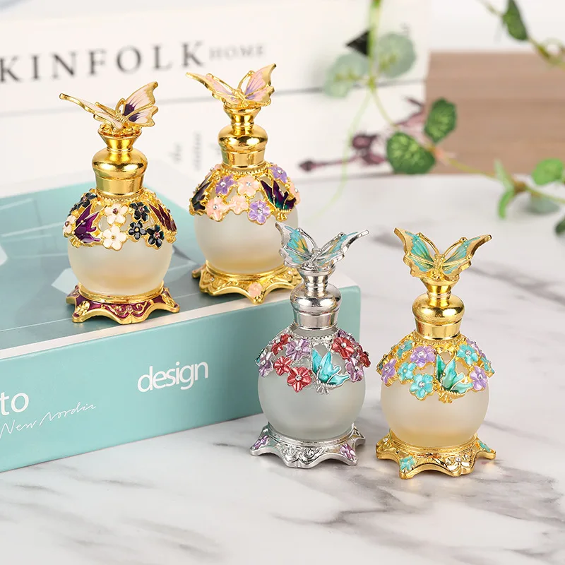 
Direct selling spot creative luxury diamond-inset Dubai web celebrity butterfly perfume bottle 15ML essential oil round ball bot 