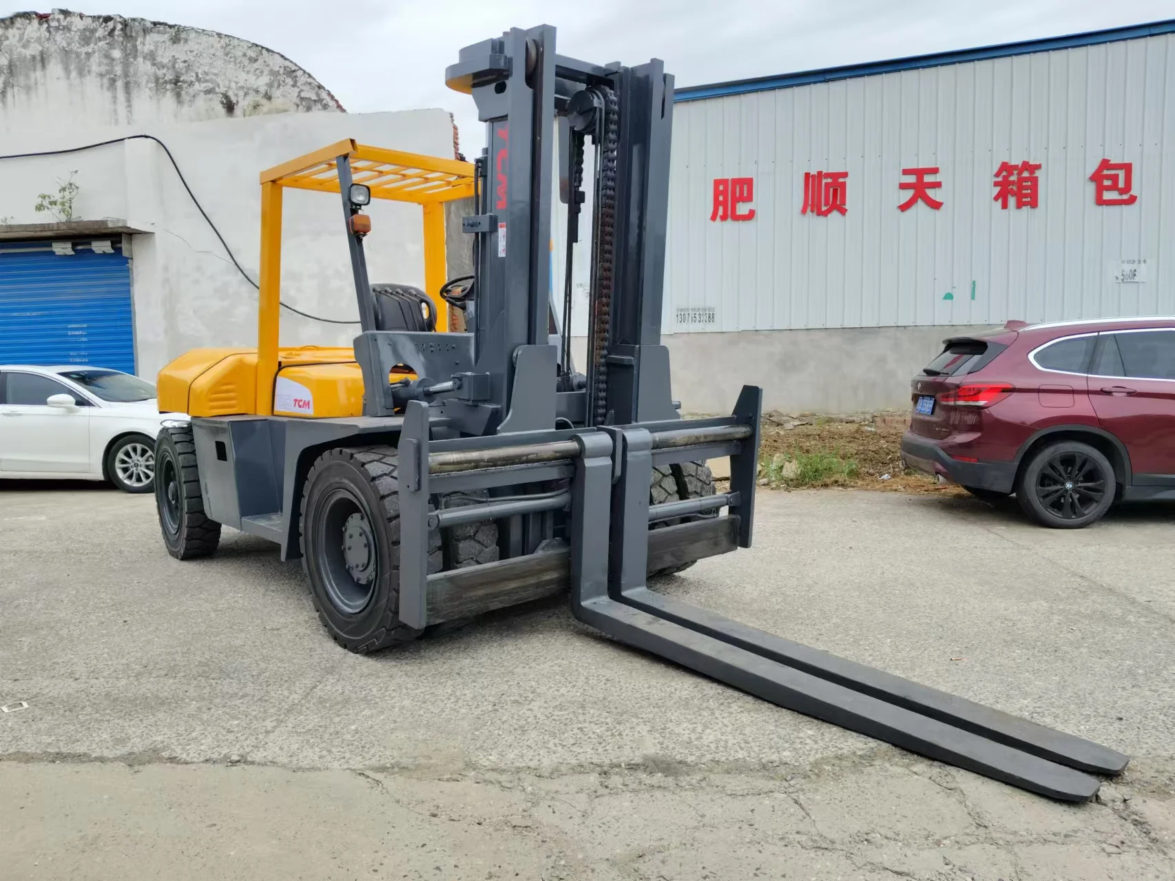 Best Price TCM FD100 10 Ton Capacity Forklift Japan Brand with Good Performance Motor Core Component for Retail Industries