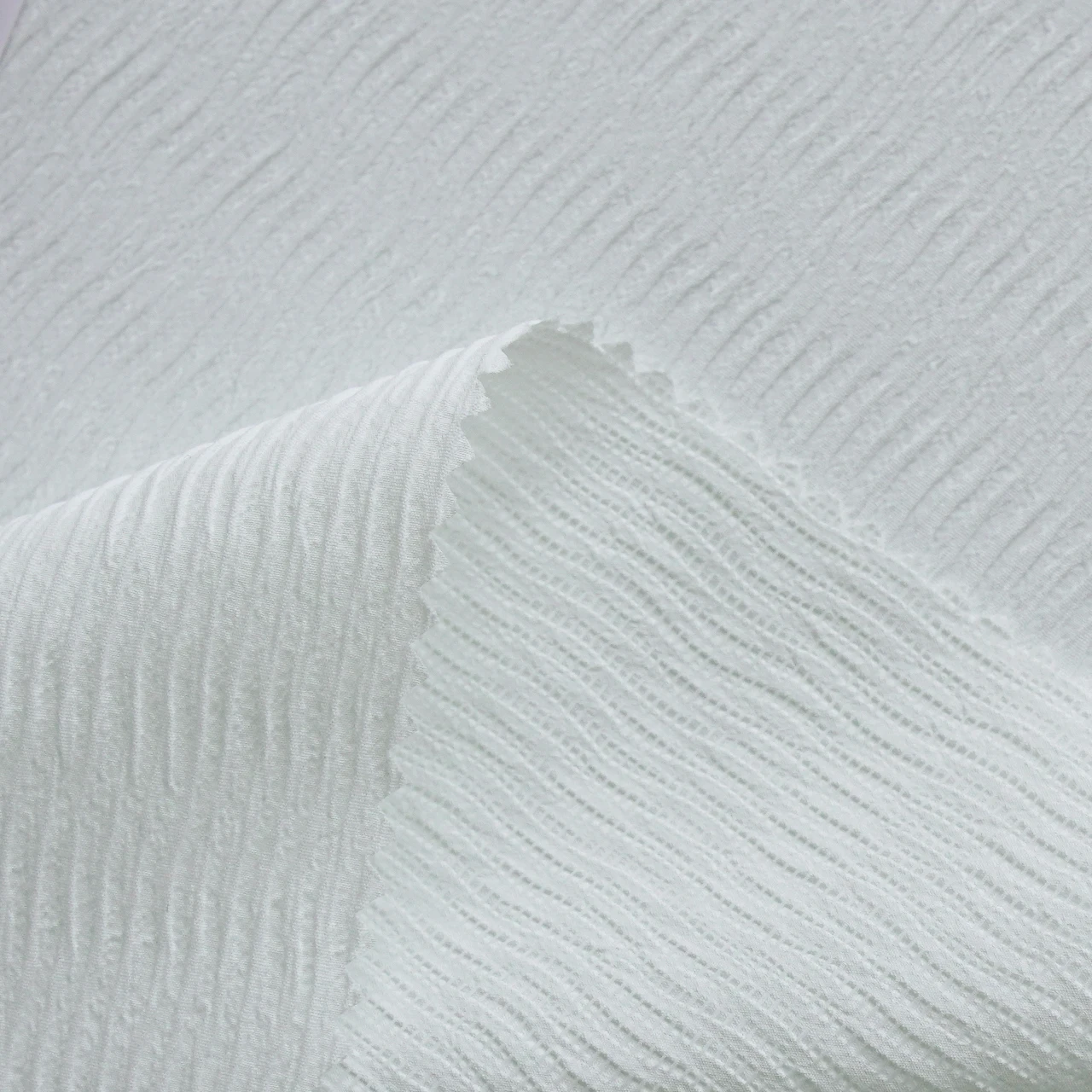 Factory direct sales of chiffon three-dimensional wave strip knitted spring and summer dresses, pants, home clothing fabrics