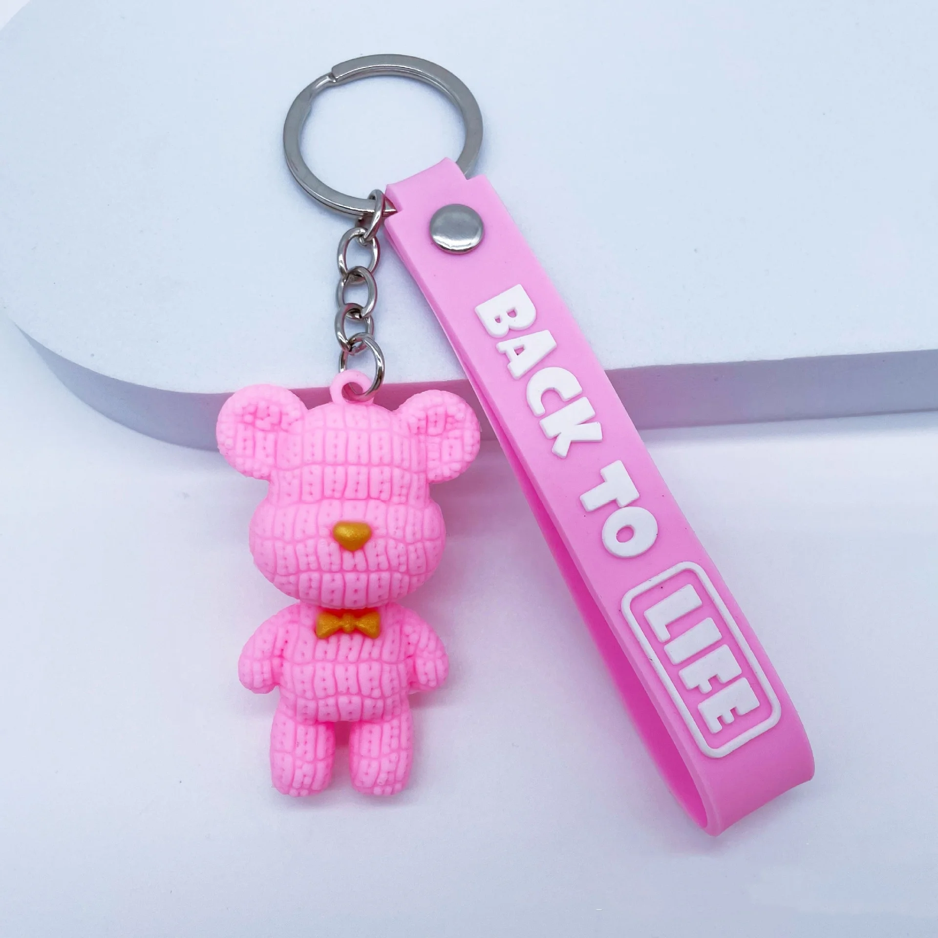 2024 New Creative Cute Cartoon Silicone Tie Knitted Bear Keychain Colorful PVC Bear Keychain For Promotional Gift